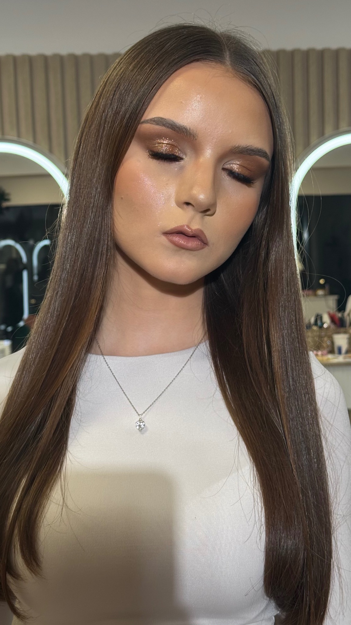 Soft glam makeup portrait with softly closed eyes