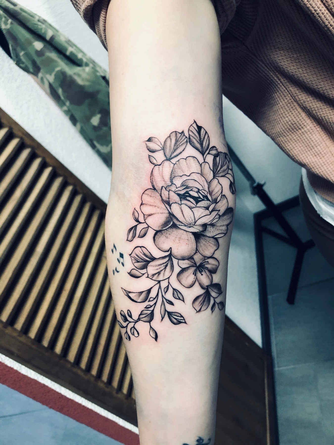 Floral forearm tattoo